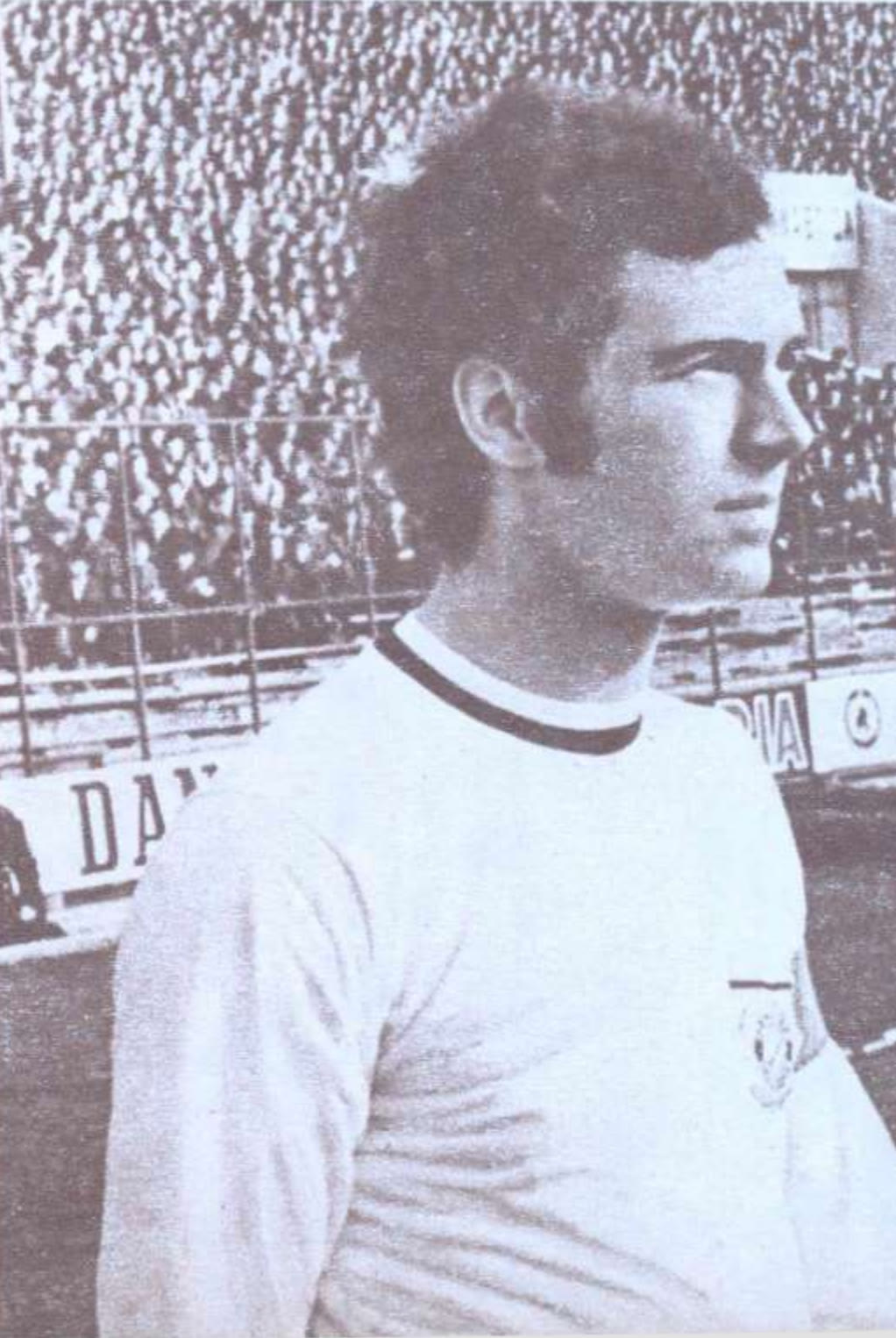 Franz Beckenbauer in a Bayern Munich shirt at a stadium in 1972