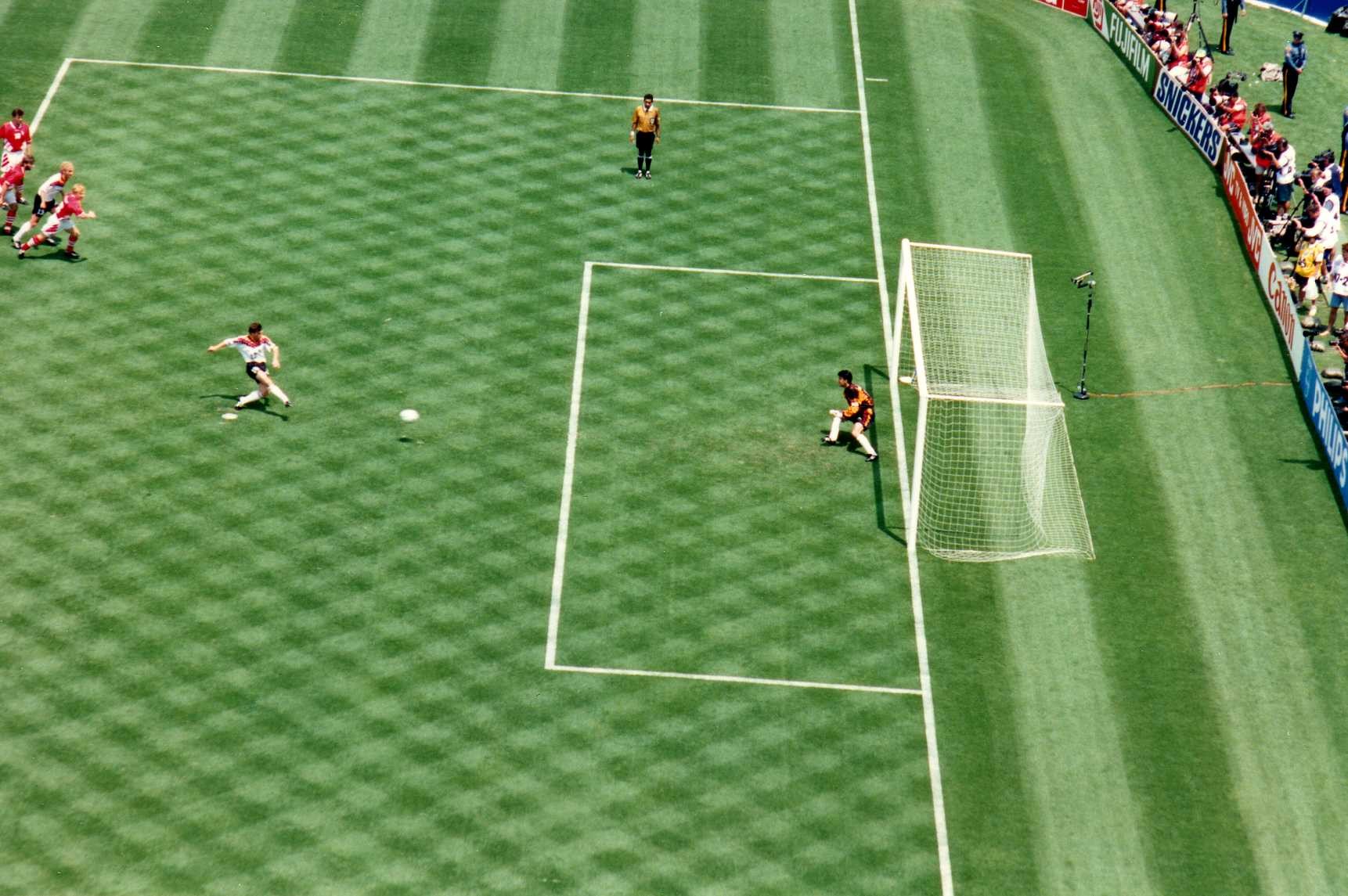 Lothar Matthäus scoring on PK for Germany against Bulgaria in the 1994 World Cup quarterfinal. Referee is José Torres Cadena.