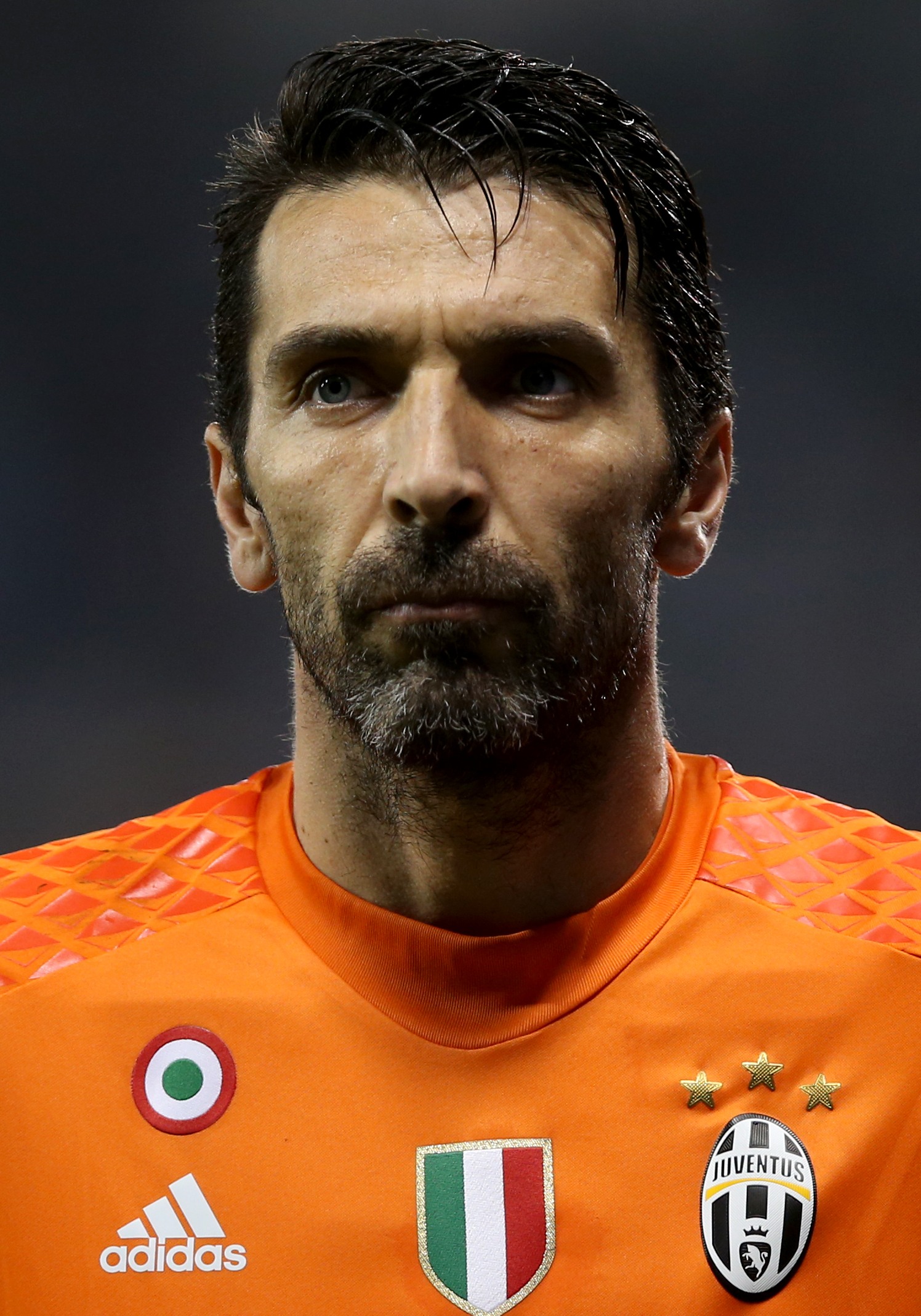 Gianluigi Buffon in an orange Juventus goalkeeper shirt during the 2016 Italian Super Cup in Doha.